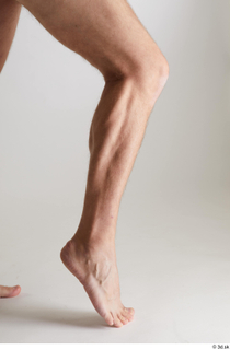 Arvid  1 calf flexing nude side view 0012.jpg